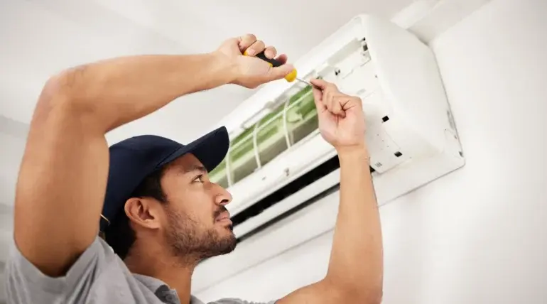 Berks Plumbing & Hvac Specialist Expert repairing AC